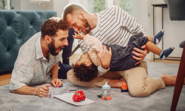Loving-LGBTQ-family-playing-toys